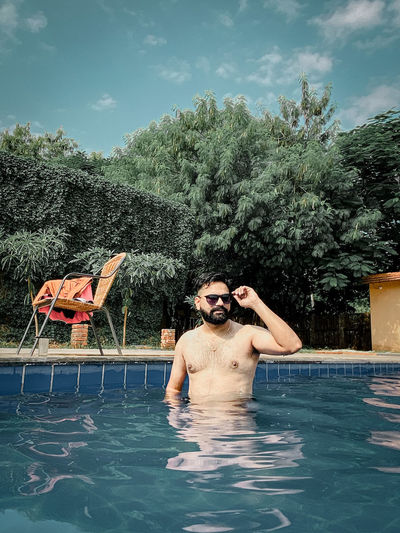 Side view of man in swimming pool