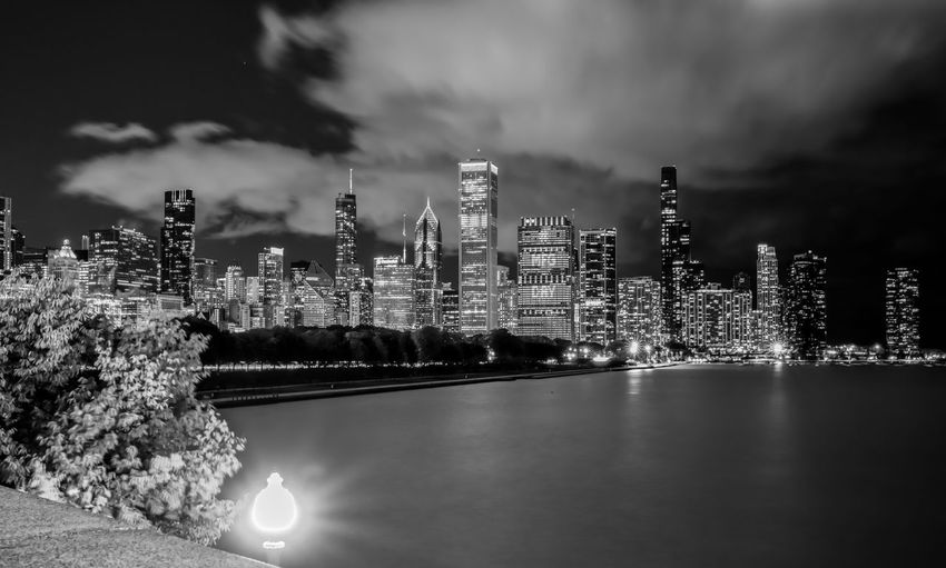 Illuminated buildings in city at night