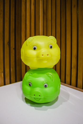 Close-up of green toy on table