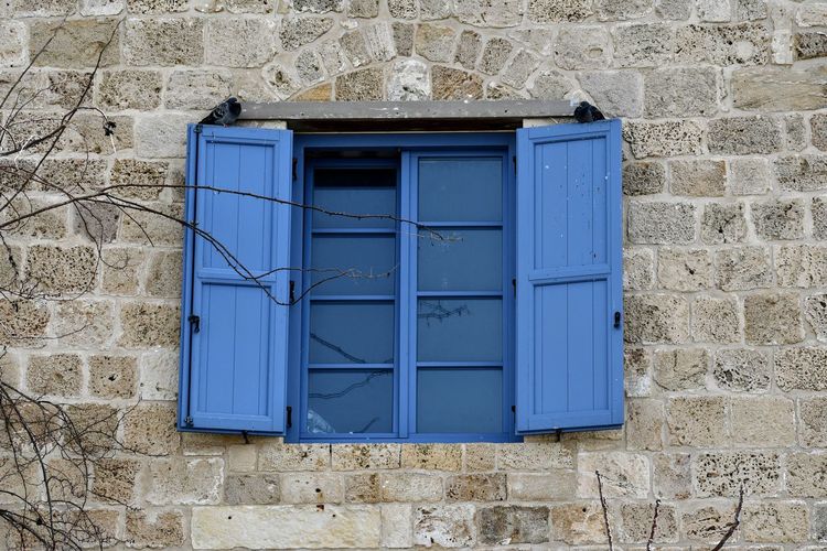 Blue closed door of building