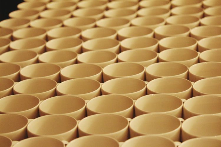 Full frame shot of bowls arranged on table