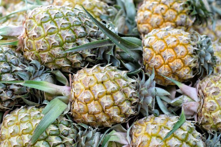 Close-up of fresh pineapples in market