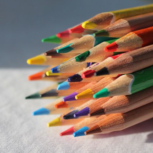 Close-up of colored pencils on table