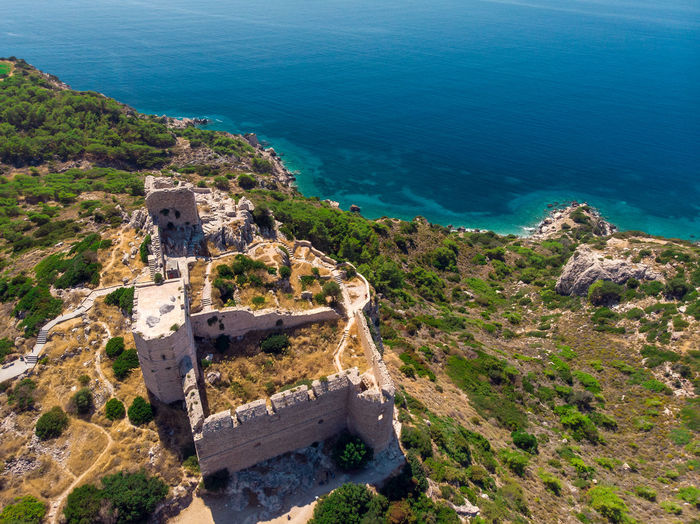 High angle view of old castle by sea