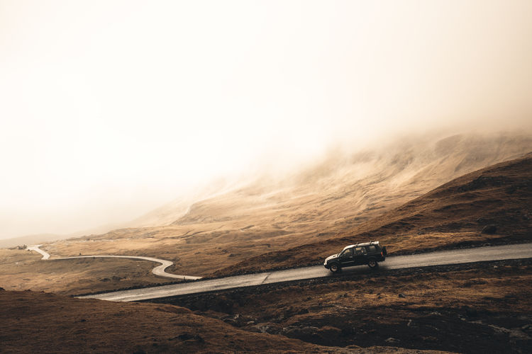 Scenic view of mountains during foggy weather