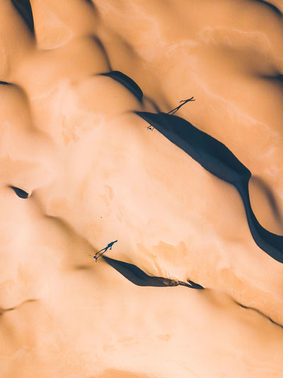 Drone view of sand dunes at desert
