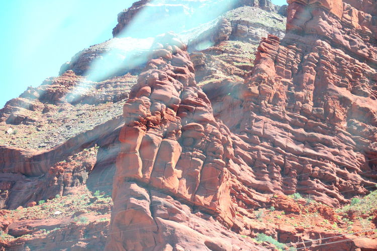 Low angle view of red rocks