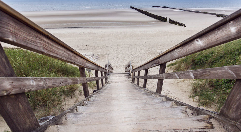 Wooden steps leading towards beach