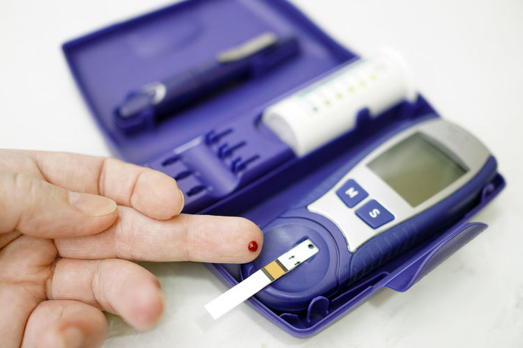 Cropped image of person checking diabetes