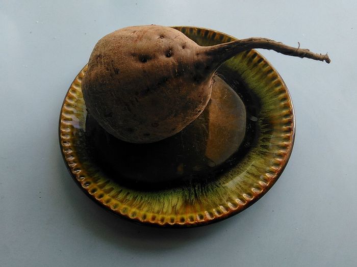 Close-up of beetroot in plate on table