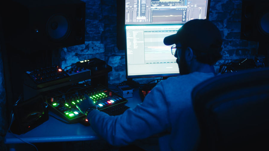 Recording studio of music producer at night