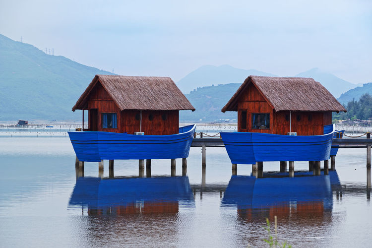 Romantic boat sheds on the shore