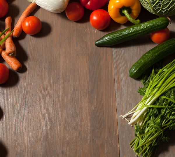High angle view of vegetables on wooden table