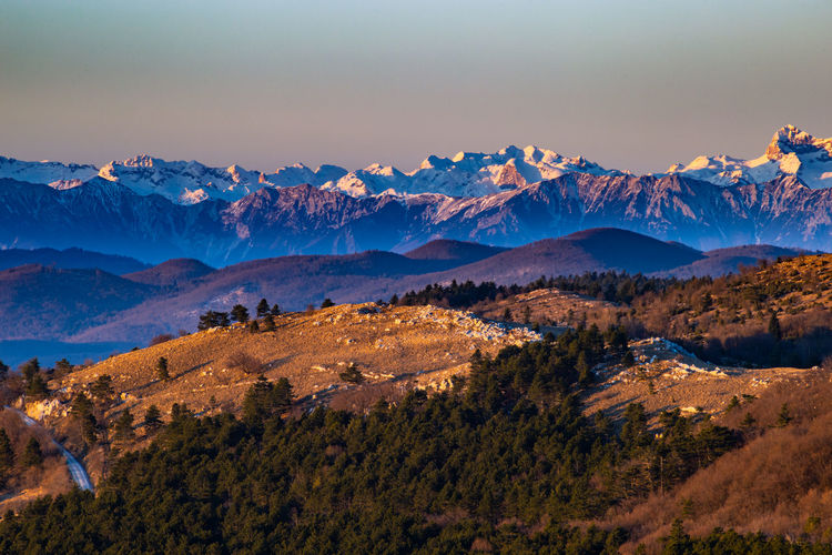 Scenic view of mountains against sky during sunset
