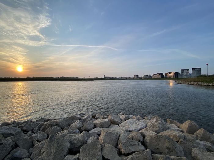 Scenic view of sea against sky during sunset