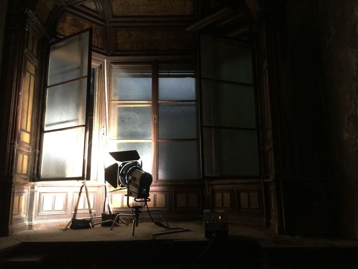 Interior of abandoned room. film set with lamp