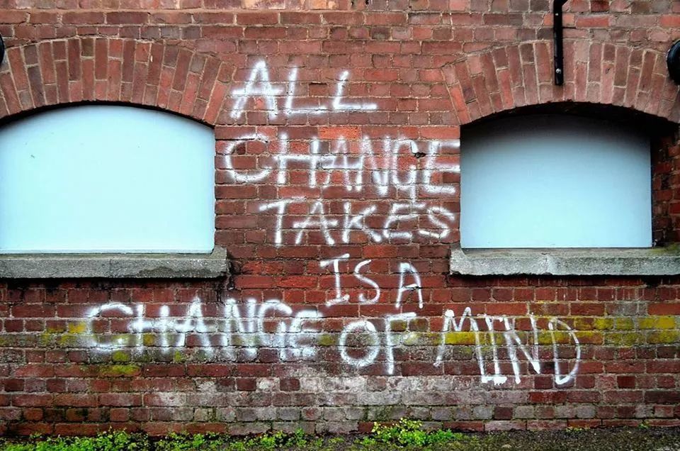 architecture, built structure, text, wall - building feature, building exterior, western script, communication, brick wall, graffiti, wall, window, capital letter, building, abandoned, damaged, day, no people, low angle view, weathered, outdoors