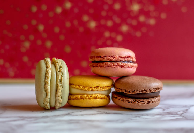 Delicious holiday macarons, include chocolate, strawberry, lemon and pistachio fillings
