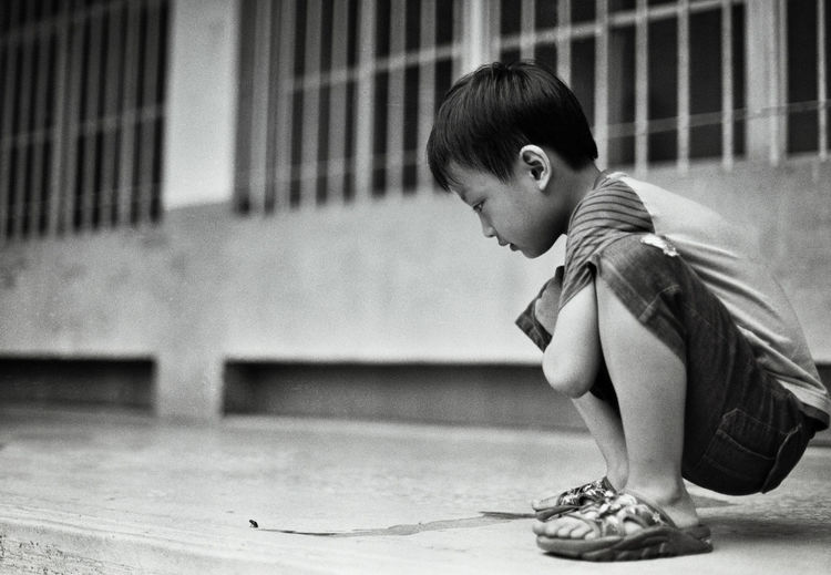 Side view of boy playing