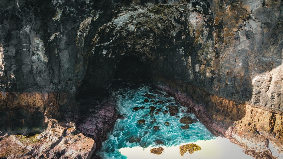 Panoramic view of sea and cave