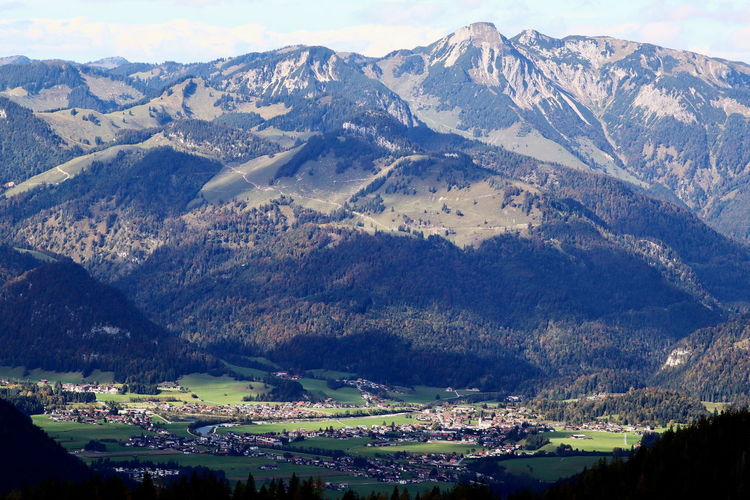 Aerial view of townscape and mountains