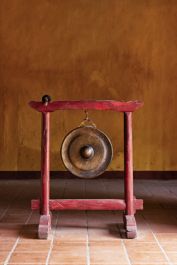 Gong bell on wooden stand