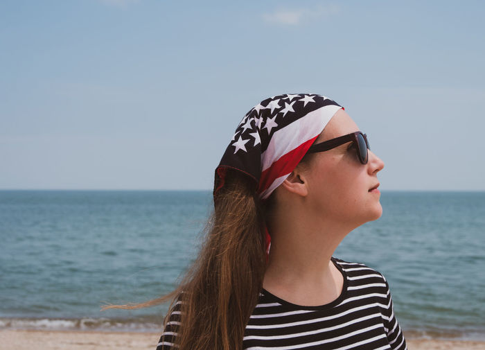 Confident girl american flag bandana. usa independence day patriotism, memorial day national pride