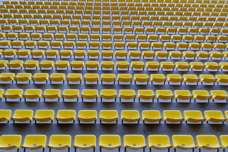 Full frame shot of yellow bleachers at stadium