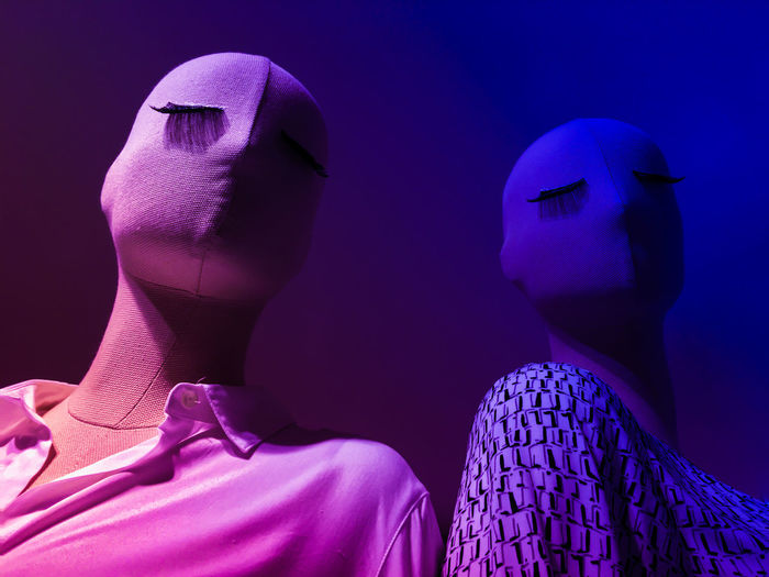 Low angle view of mannequin in illuminated room