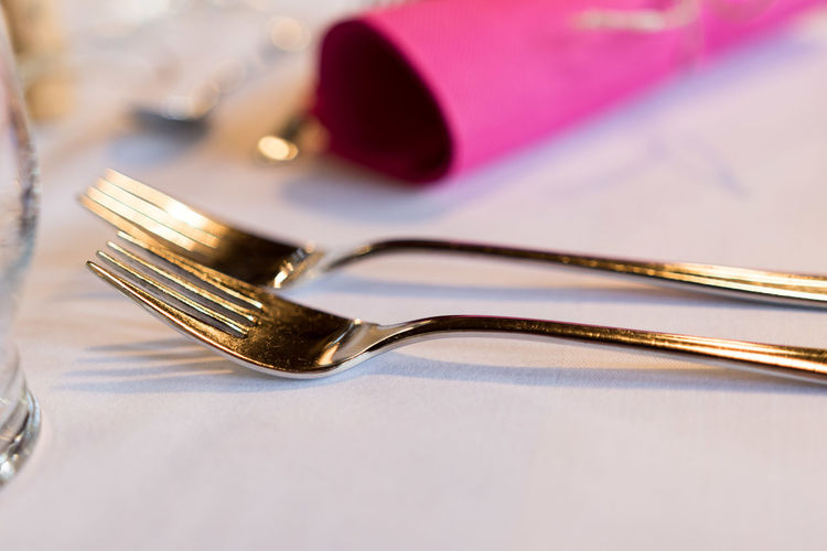 Close-up of forks on table