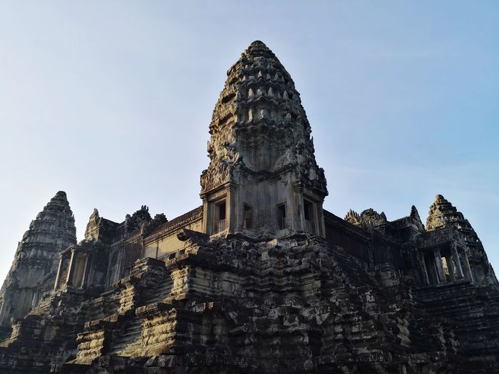 Low angle view of historical building against sky at angkor wat cambodia