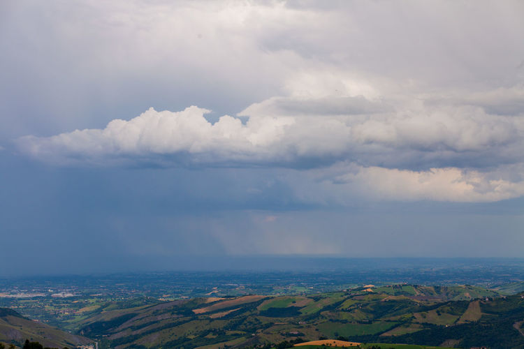 A storm on modena plain seen from little city of serramazzoni on the hills