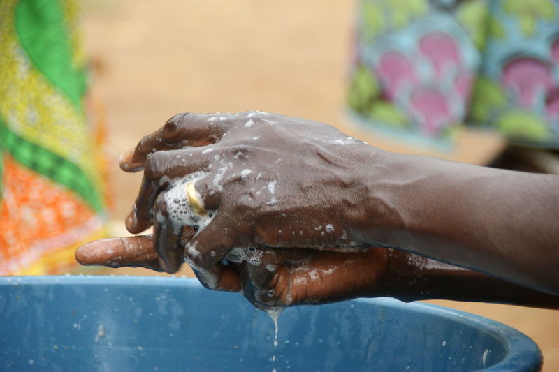 Close-up of washing hand with water and soap