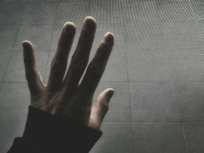 Cropped image of man hand against flooring