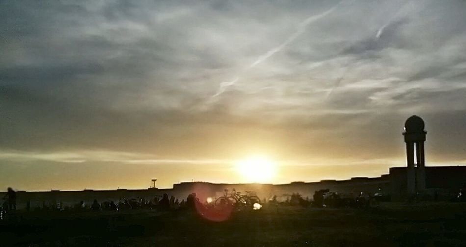 Sun shining through clouds