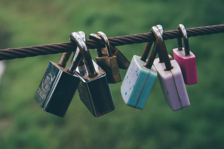 Close-up of padlocks on rope
