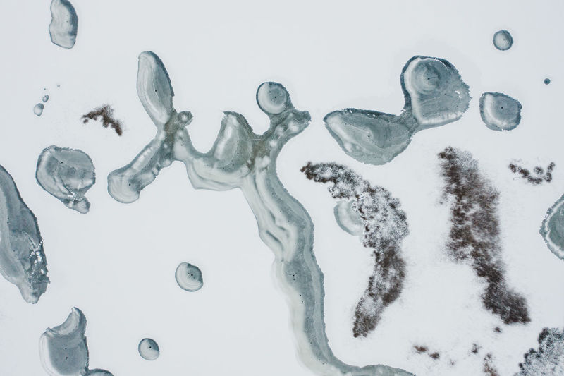 Close-up of bubbles against white background