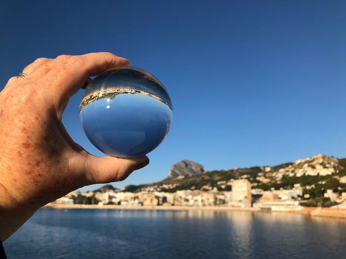 Looking through a crystal ball  to mediterranean coast at javea