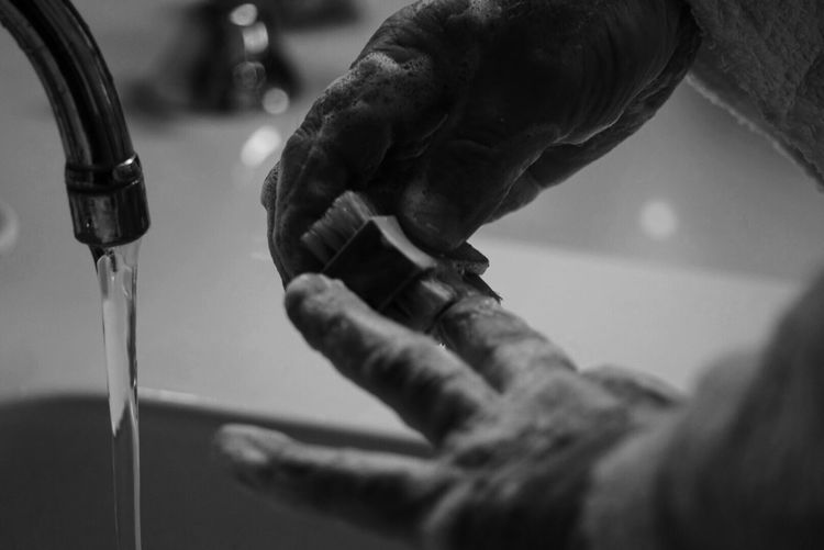 Close-up of hand holding hands