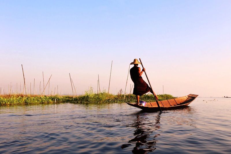 View of person in boat at lake