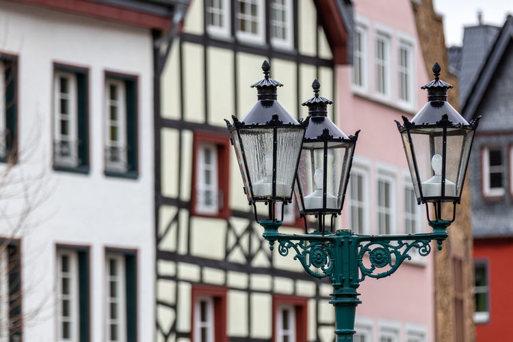 Half-timbered house and street lamps in bad muenstereifel, germany
