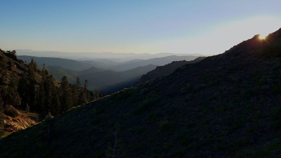 Scenic view of mountains at sunset