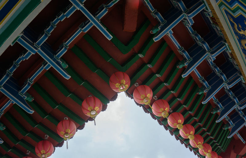 Low angle view of lantern hanging in temple