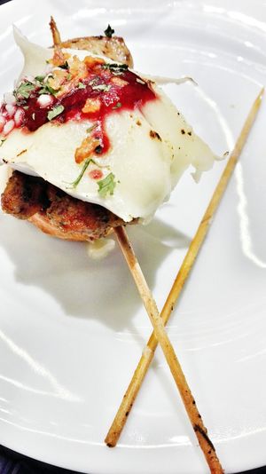 High angle view of pincho served on plate