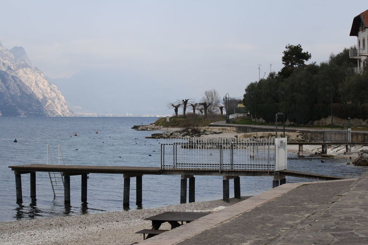 Pier over sea against sky