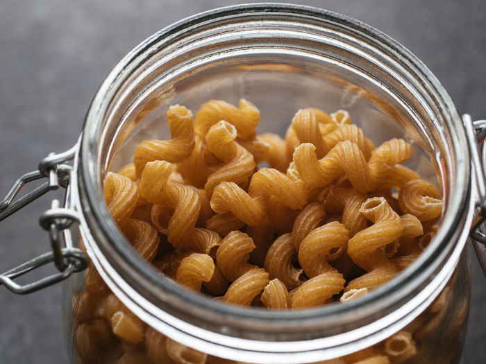 High angle view of pasta in container on table