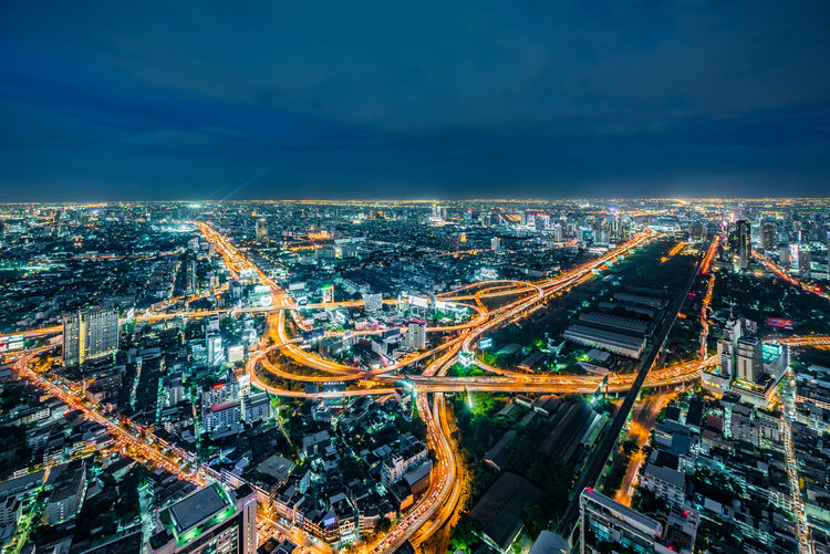 High angle view of illuminated city at night