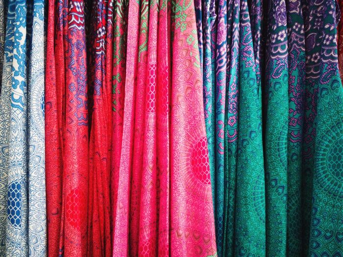 Full frame shot of colorful fabrics for sale at store