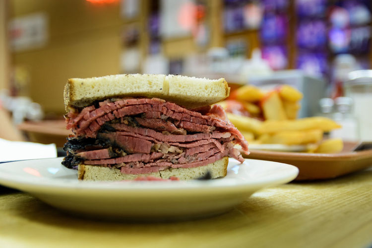 Close-up pastrami sandwich on plate