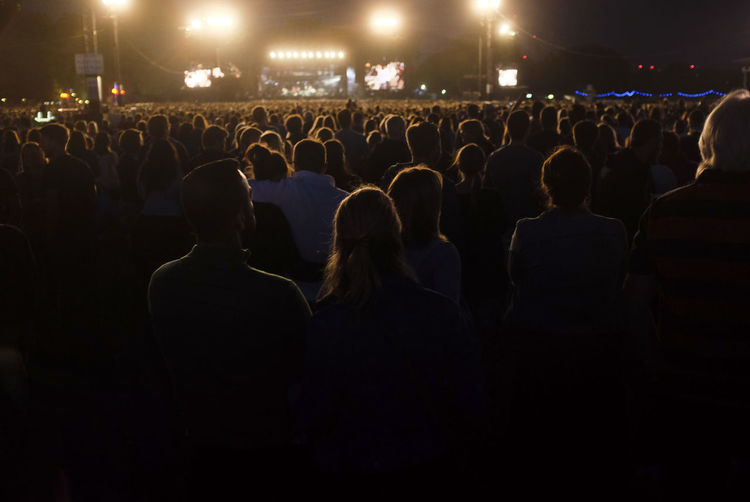 People in concert at night